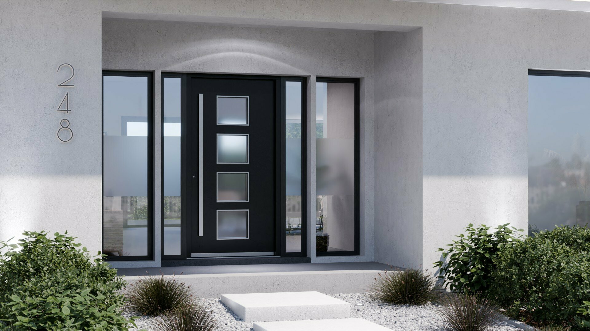 Eine moderne schwarze Haustür mit Glasscheiben und einem silbernen Griff ist in eine weiße Betonwand eingelassen, begleitet von einer weißen Betonstufe und einem kleinen Garten mit Grünpflanzen.